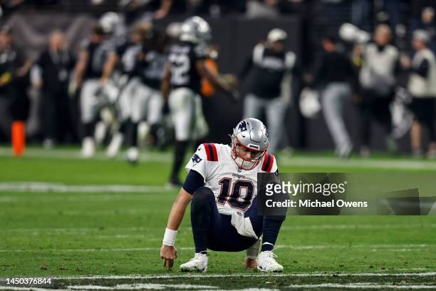 Mac Jones of the New England Patriots reacts after losing to the Las Vegas Raiders following an NFL football game between the Las Vegas Raiders and...