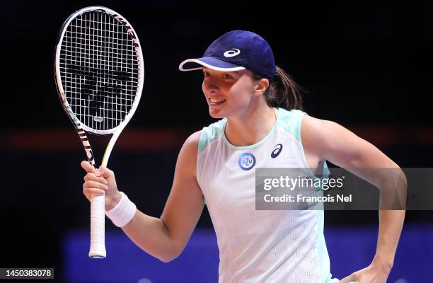 Iga Swiatek of Kites celebrates victory against Caroline Garcia of Eagles during day on of the World Tennis League at Coca-Cola Arena on December 19,...