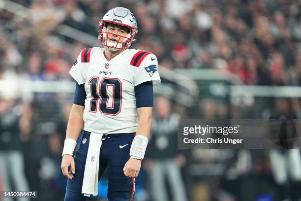 Quarterback Mac Jones of the New England Patriots reacts after a play during the second half of the game against the Las Vegas Raiders at Allegiant...