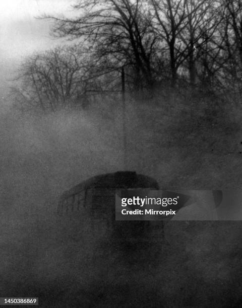 Foggy conditions in 1952 made travel difficult for London Transport. Here a bus carefully navigates Central Hill in Upper Norwood, South East London....