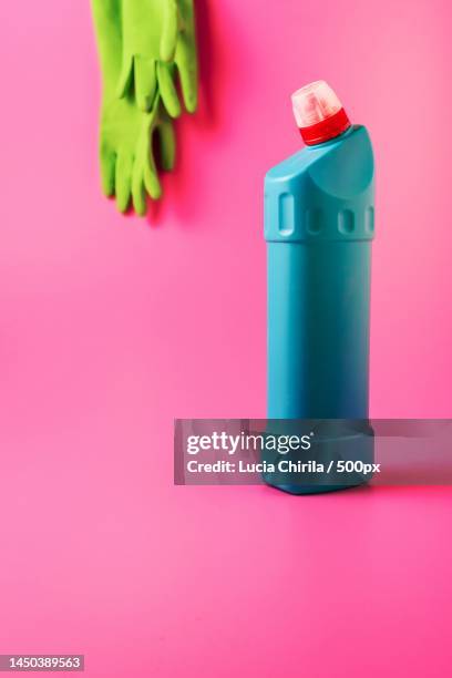 close-up of spray bottle against pink background - close up of a cleansing spray nozzle stock pictures, royalty-free photos & images