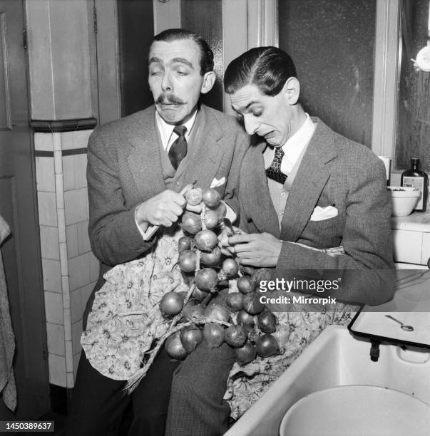 Comedy scriptwriters Frank Muir and Denis Norden. December 1952.