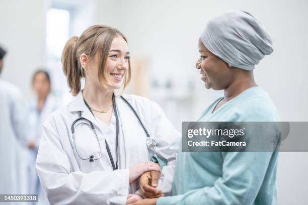 oncologist supporting a patient - cancer portrait bildbanksfoton och bilder