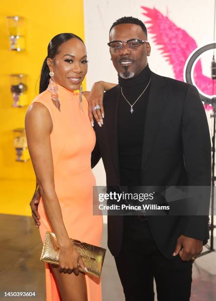 Aaron Ross and Sanya Richards-Ross attend Kandi's Peach Social at Bedroom Kandi Museum on December 16, 2022 in Atlanta, Georgia.