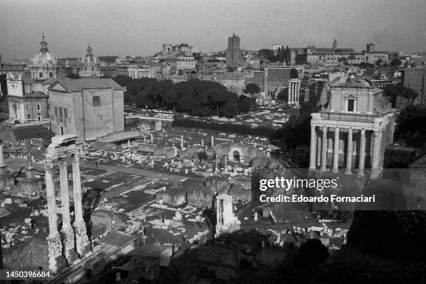 View of the Temple of the Dioscuri , the Roman Forum , and the Temple of Antonio and Faustina , Rome, Italy, May 14, 1986.