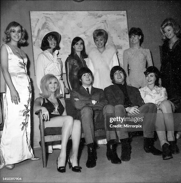 Beatles John Lennon and Paul McCartney backstage with show girls during the Music of Lennon and McCartney television spectacular. November 1965.