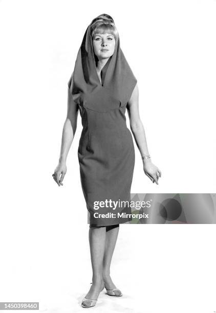 Caron Gardner modelling a sleeveless summer dress with matching shawl. December 1964.