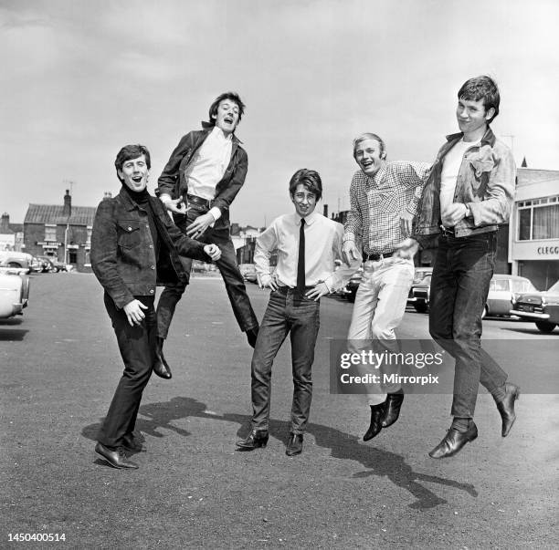 The Hollies pop group in happy mood in Stockport after hearing news that their latest single I'm Alive has reached Number One in the UK Singles...