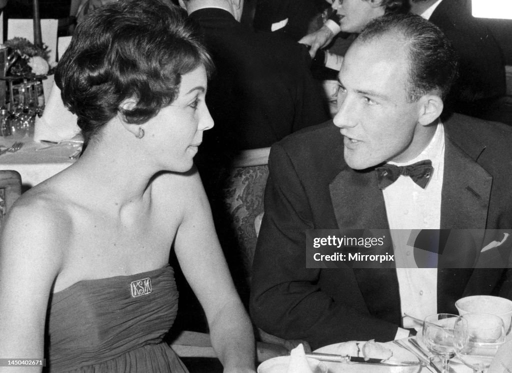 Stirling Moss talking to his wife Katie at Lord Taverner's Ball