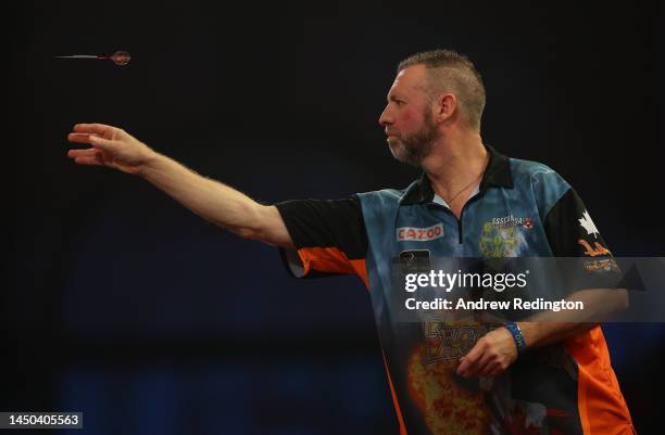 David Cameron of Canada in action on Day Five of the Cazoo World Darts Championship at Alexandra Palace on December 19, 2022 in London, England.