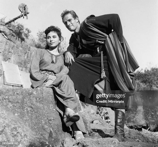 Actors Haya Harareet and Charlton Heston between takes during the making of the film Ben Hur in Rome. 1958.