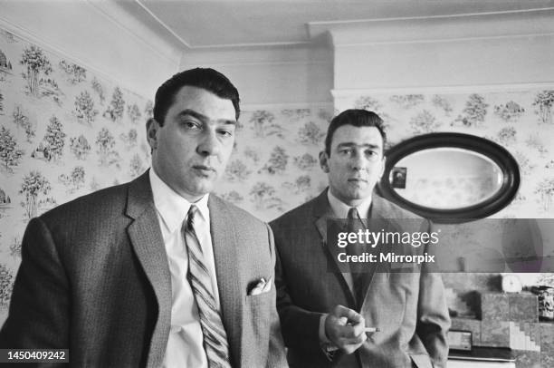 Kray twins Ronald and Reginald at home after helping police with their inquiries into the Blind Beggar Pub shooting. 6th August 1966.