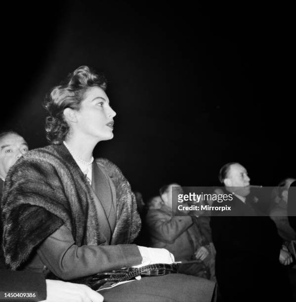 Actress Ava Gardner watching the middleweight title fight between Randy Turpin and Walter Cartier at Earls Court Empress Hall, Kensington, London,...