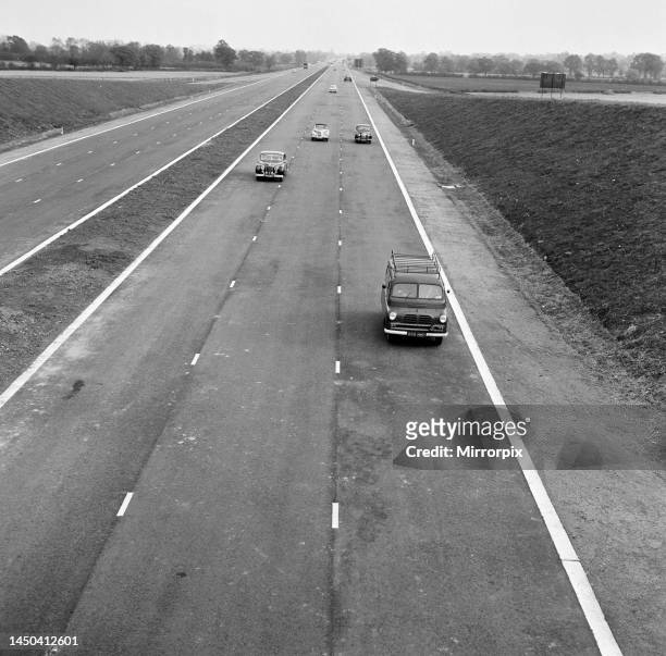 The M1 Motorway, opened yesterday, receives it's first vehicles. Picture shows the area of the M1 in the Luton area, Bedfordshire, north of London....
