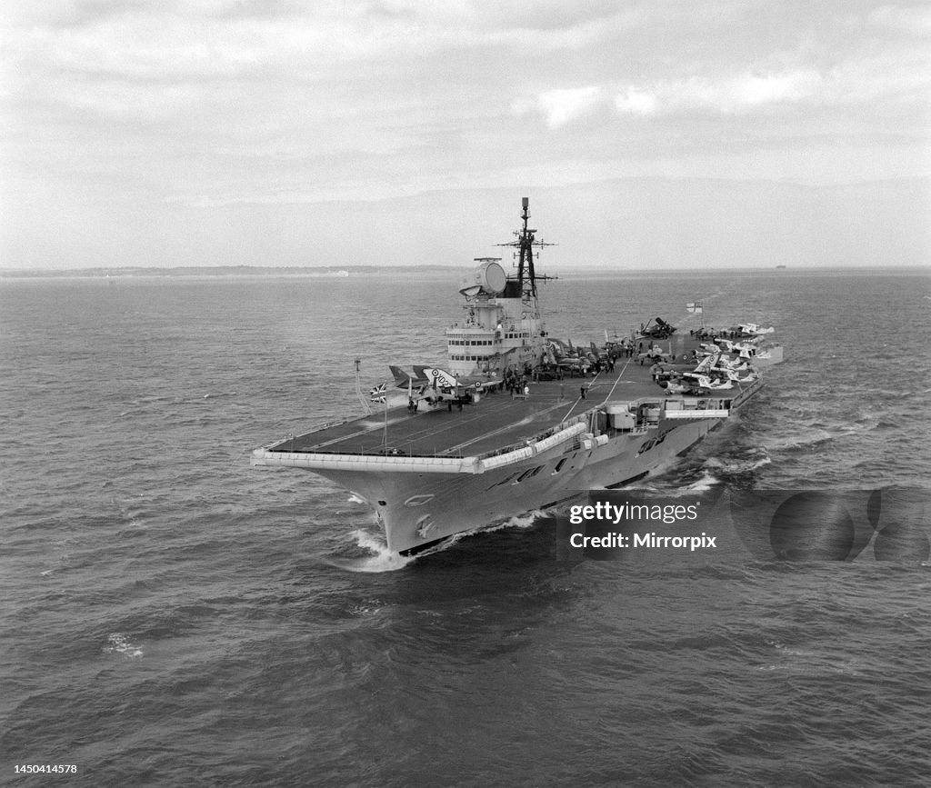 Royal Navy Aircraft Carrier HMS Victorious steams through the Solent ...