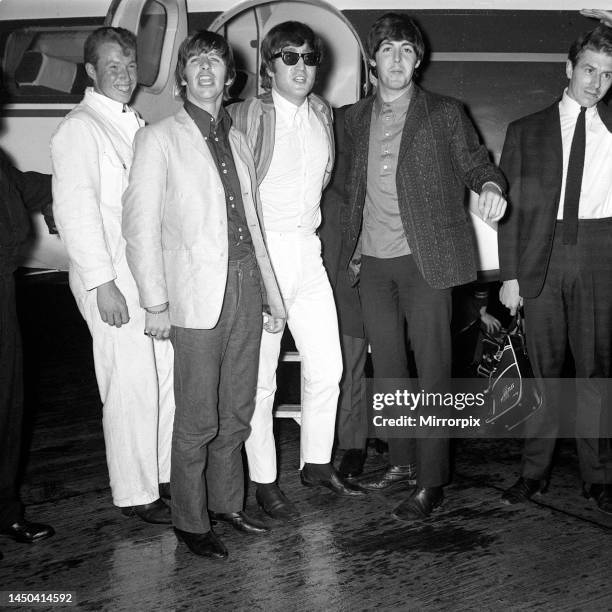 Ringo Starr, John Lennon and Paul McCartney of The Beatles pictured at Blackpool Airport as they arrive for an appearance on the Blackpool Night Out...