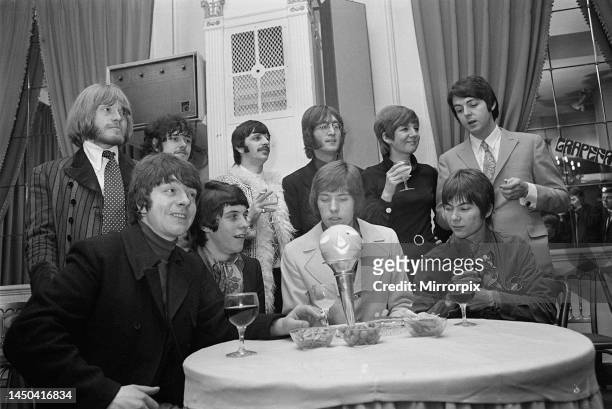 John Lennon, Ringo Starr and Paul McCartney with Cilla Black, Rolling Stone Brian Jones and Donovan next to him. With the Apple managed band...