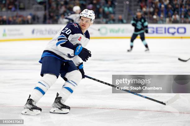 Karson Kuhlman of the Winnipeg Jets skates against the Seattle Kraken during the third period at Climate Pledge Arena on December 18, 2022 in...