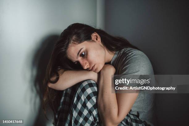 young woman struggle with anxiety and depression. - domestic violence stock pictures, royalty-free photos & images