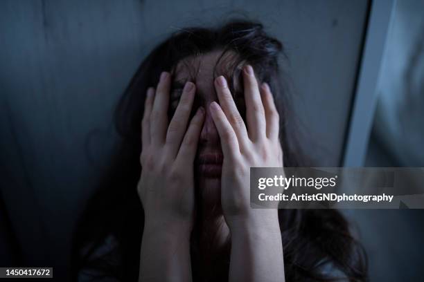 suffering from depression and sadness. having a mental breakdown. - domestic violence stock pictures, royalty-free photos & images