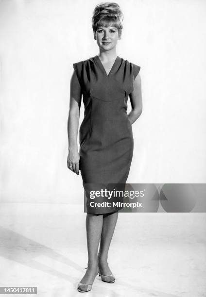 Caron Gardner modelling sleeveless summer dress. December 1964.