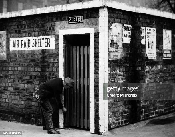 The door of an air raid shelter is checked in George Square, Glasgow.