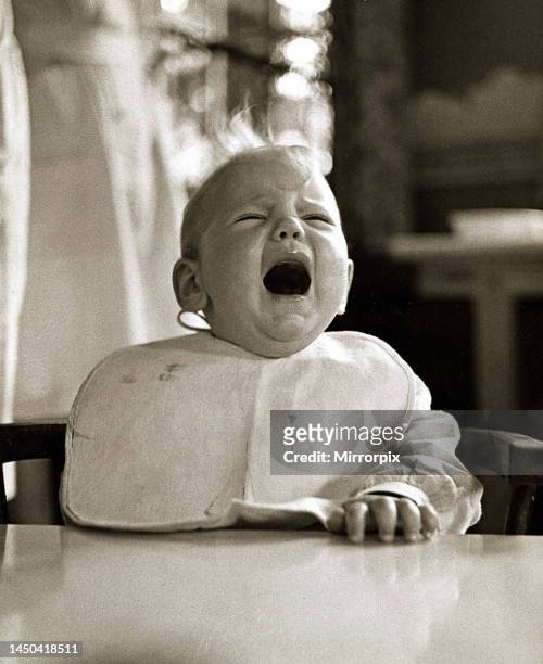 Crying baby with its mouth open. 1947.