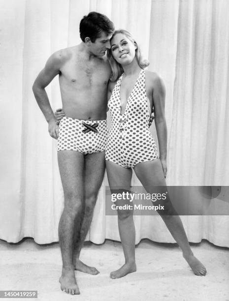 Swimsuit fashion 1966: Joan Crane and Derek Nesbitt wearing His and Hers spotted swimsuits in stretch material. 20th October 1966.