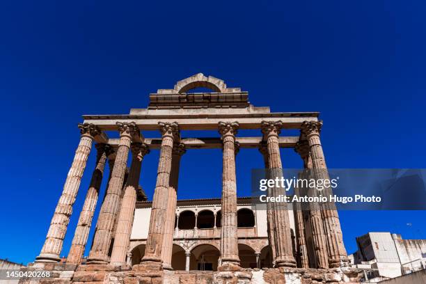 ruins of the ancient roman temple of diana in the city of merida, extremadura, spain. - diana roman goddess stock pictures, royalty-free photos & images