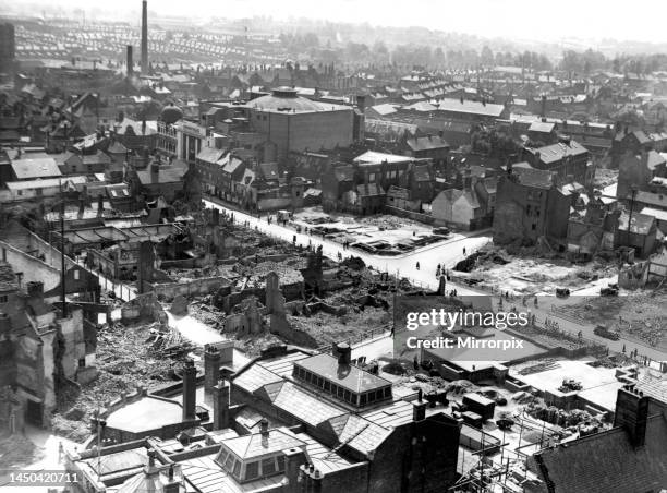 Earl Street, Coventry, viewed from the old cathedral spire some time after the blitz. The domed building is the Gaumont Palace cinema which later...