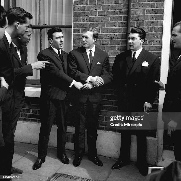 Reginald Kray, Charlie Kray and Ronald Kray outside their family home in Valance Road London's East End after the twins Reggie and Ronnie were...