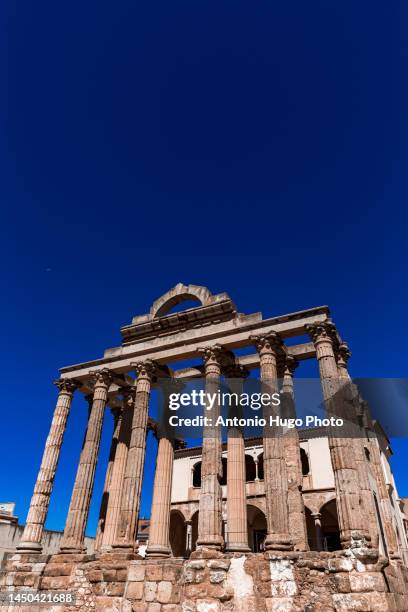 ruins of the ancient roman temple of diana in the city of merida, extremadura, spain. - diana roman goddess stock pictures, royalty-free photos & images