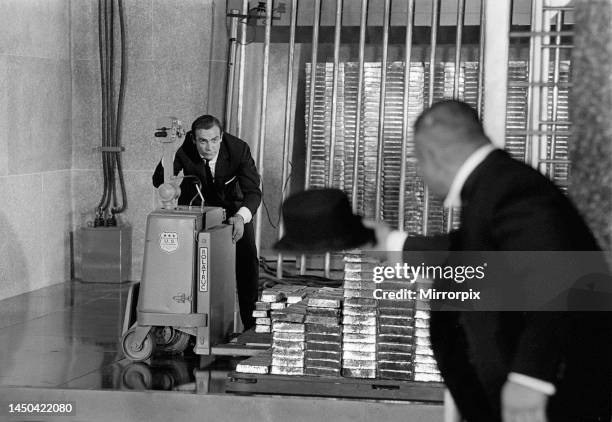 Goldfinger - 1964 Sean Connery as James Bond 007 fighting with Goldfinger's henchman Odd Job in the vault at Fort Knox. August 1964.