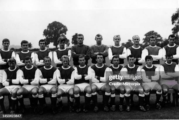 Arsenal pose for a group photograph ahead of the start of the 1964 - 1965 football season. Back Row - L to R - Geoff Strong, Joe Baker, Jon Sammels,...