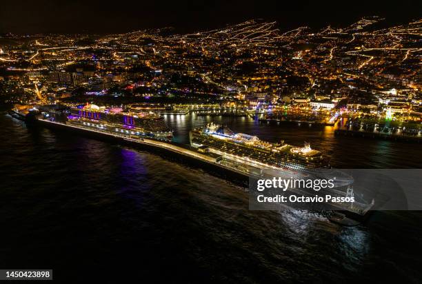 View for the Azura Ship and AIDANOVA Ship at the Port of Funchal with the view of Christmas city lights on December 19, 2022 in Funchal, Madeira,...