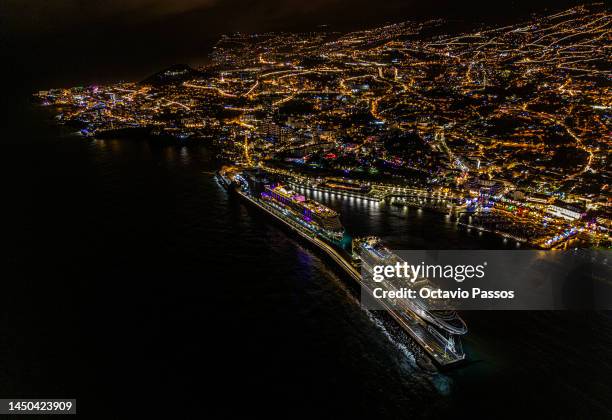 View for the Azura Ship and AIDANOVA Ship at the Port of Funchal with the view of Christmas city lights on December 19, 2022 in Funchal, Madeira,...