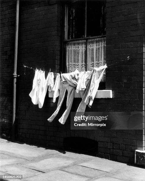 Washing line near a terraced house in Manchestercirca 1955.