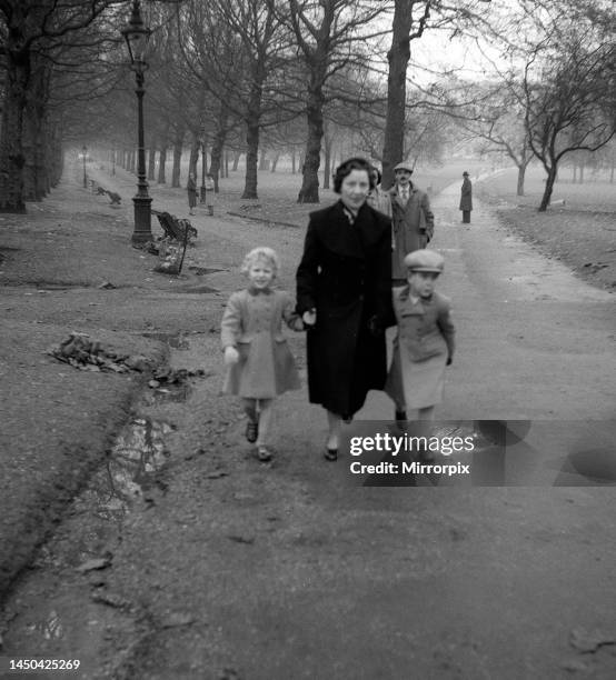 Prince Charles and Princess Anne in Green Park, London. November 1954.