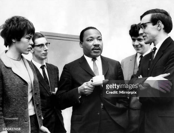 Dr Martin Luther King, the American civil rights leader, pictured with a group of students at Newcastle University for the receiving of an honorary...