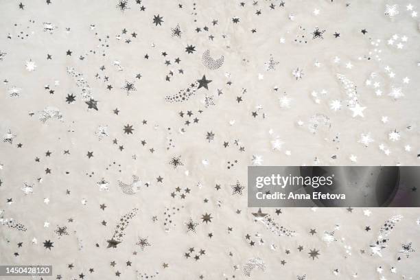 white and grey fluffy background with silver sparkles and stars on it. merry christmas, happy new year, anniversary or birthday concept - auguri di buon anniversario foto e immagini stock