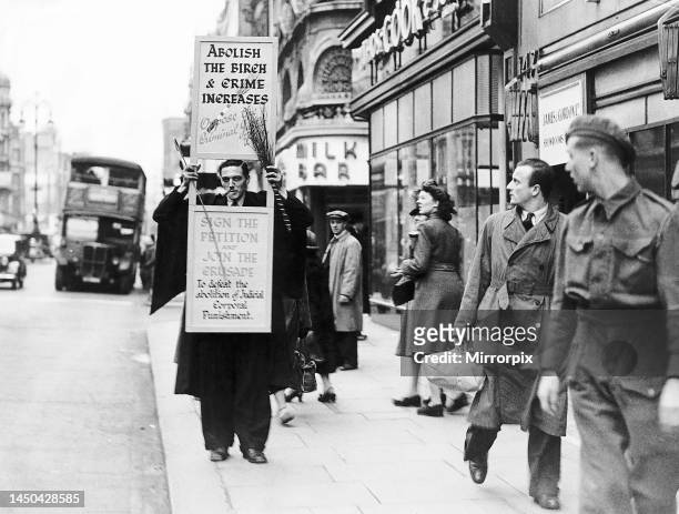 Eric Wildman in the streets of London with his propaganda boards petitioning against the abolition of Judicial Corporal Punishment, 12th November...