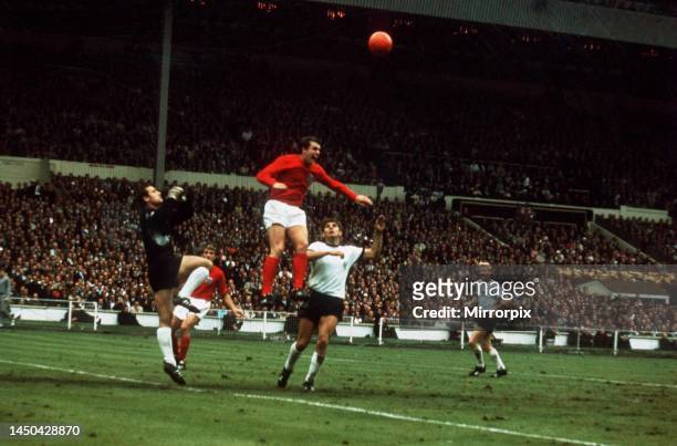 England versus West Germany. Geoff Hurst jumps to head the ball. 30th July 1966.