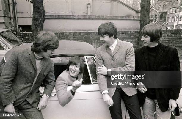 The Beatles by John Lennon's car after he passed his test - 15th February 1965. L-R George Harrison, John Lennon , Paul McCartney and Ringo Starr.