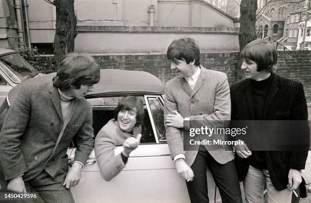 The Beatles by John Lennon's car after he passed his test - 15th February 1965. L-R George Harrison, John Lennon , Paul McCartney and Ringo Starr.