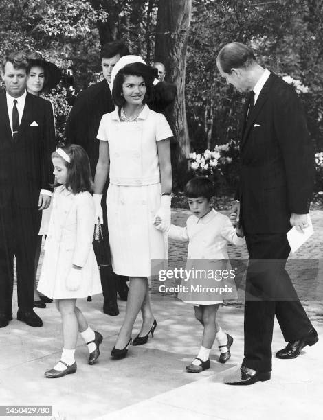 Jackie Kennedy, widow of assassinated US President John F. Kennedy, with her children John and Caroline talking to Prince Philip, the Duke of...