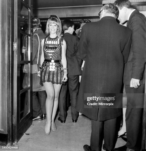 World Premiere of Here we go Round the Mulberry Bush at the London Pavilion. Actress Carol Dilworth who appears in the film arrived wearing this mini...