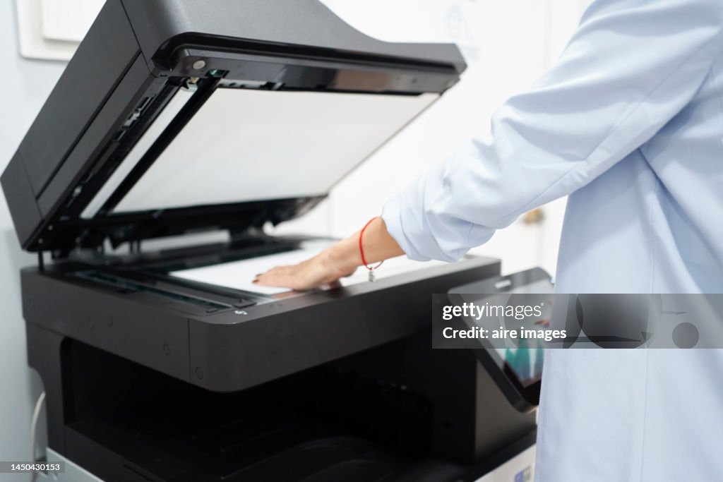 Closeup View Of White Womans Hands Using Computer Printer In Office ...