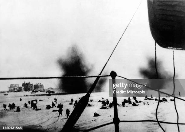 Bombs from German dive bombers explode during the evacuation of the BEF from the beaches at Dunkirk. June 1940.