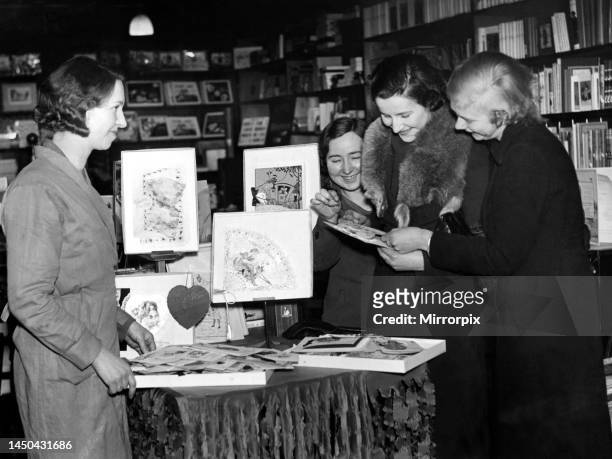These three young ladies just can't decide which cards to choose for their loved one on St Valentine's Day in a Newcastle shop. 13 February 1937.