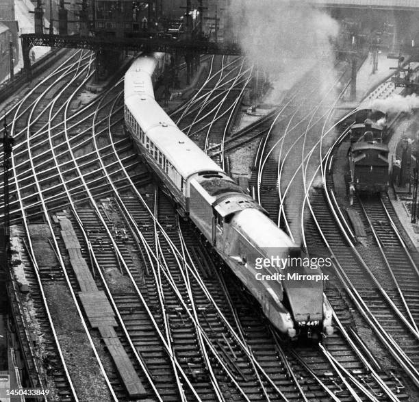 The Coronation, a streamlined train, snaking its way out of Newcastle Central Station on 2nd July 1937 en route to Edinburgh, three days before its...